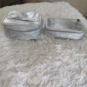 Stephanie Johnson silver snake skin travel case and makeup bag